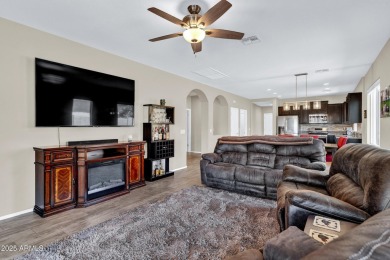 This wonderful single-story residence offers 3 spacious bedrooms on The Golf Club At Johnson Ranch in Arizona - for sale on GolfHomes.com, golf home, golf lot