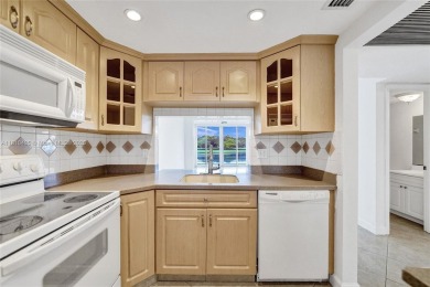 Beautifully maintained 2-bedroom, 2-bath in the highly on Pine Island Ridge Country Club in Florida - for sale on GolfHomes.com, golf home, golf lot