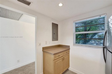 Beautifully maintained 2-bedroom, 2-bath in the highly on Pine Island Ridge Country Club in Florida - for sale on GolfHomes.com, golf home, golf lot