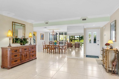 Exceptional lake and golf course views from this spacious on Quail Ridge Golf Course and Country Club in Florida - for sale on GolfHomes.com, golf home, golf lot