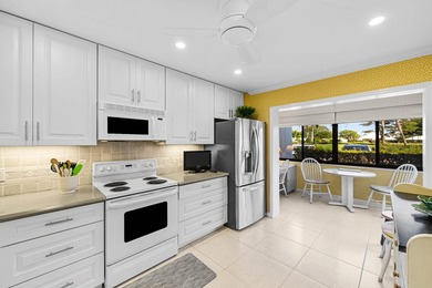 Exceptional lake and golf course views from this spacious on Quail Ridge Golf Course and Country Club in Florida - for sale on GolfHomes.com, golf home, golf lot