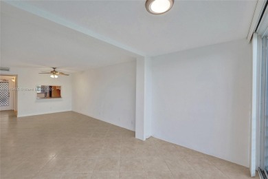 Beautifully maintained 2-bedroom, 2-bath in the highly on Pine Island Ridge Country Club in Florida - for sale on GolfHomes.com, golf home, golf lot