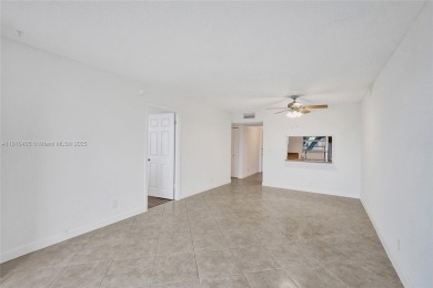 Beautifully maintained 2-bedroom, 2-bath in the highly on Pine Island Ridge Country Club in Florida - for sale on GolfHomes.com, golf home, golf lot