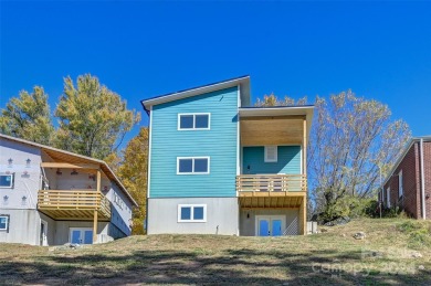 Discover a thoughtfully designed NET-ZERO home, ideally located on Crowne Plaza Tennis and Golf Resort in North Carolina - for sale on GolfHomes.com, golf home, golf lot