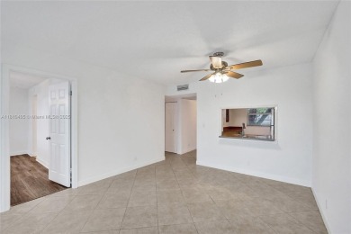 Beautifully maintained 2-bedroom, 2-bath in the highly on Pine Island Ridge Country Club in Florida - for sale on GolfHomes.com, golf home, golf lot