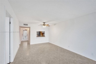 Beautifully maintained 2-bedroom, 2-bath in the highly on Pine Island Ridge Country Club in Florida - for sale on GolfHomes.com, golf home, golf lot