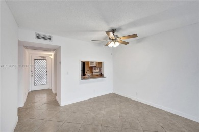 Beautifully maintained 2-bedroom, 2-bath in the highly on Pine Island Ridge Country Club in Florida - for sale on GolfHomes.com, golf home, golf lot