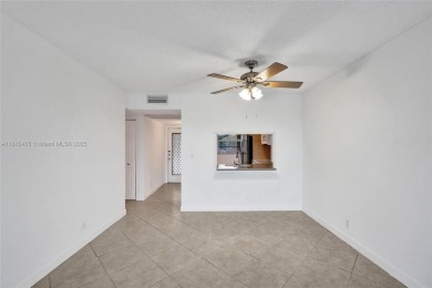 Beautifully maintained 2-bedroom, 2-bath in the highly on Pine Island Ridge Country Club in Florida - for sale on GolfHomes.com, golf home, golf lot