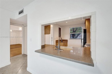 Beautifully maintained 2-bedroom, 2-bath in the highly on Pine Island Ridge Country Club in Florida - for sale on GolfHomes.com, golf home, golf lot