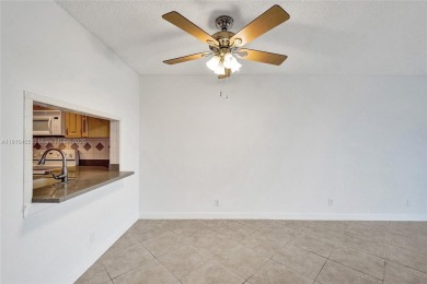 Beautifully maintained 2-bedroom, 2-bath in the highly on Pine Island Ridge Country Club in Florida - for sale on GolfHomes.com, golf home, golf lot