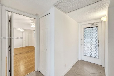 Beautifully maintained 2-bedroom, 2-bath in the highly on Pine Island Ridge Country Club in Florida - for sale on GolfHomes.com, golf home, golf lot