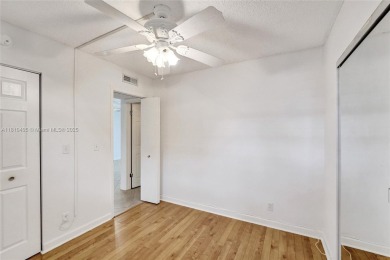 Beautifully maintained 2-bedroom, 2-bath in the highly on Pine Island Ridge Country Club in Florida - for sale on GolfHomes.com, golf home, golf lot