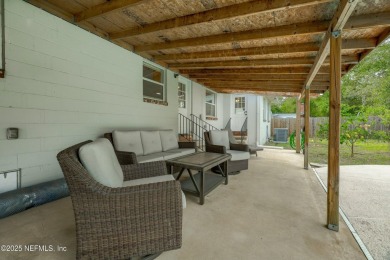 This well-maintained 1960s concrete block home blends classic on Blue Cypress Golf Club in Florida - for sale on GolfHomes.com, golf home, golf lot