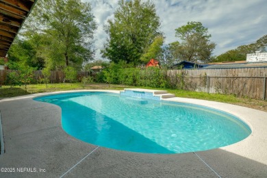 This well-maintained 1960s concrete block home blends classic on Blue Cypress Golf Club in Florida - for sale on GolfHomes.com, golf home, golf lot