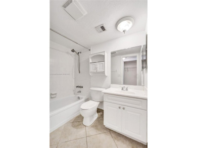 Beautifully maintained 2-bedroom, 2-bath in the highly on Pine Island Ridge Country Club in Florida - for sale on GolfHomes.com, golf home, golf lot