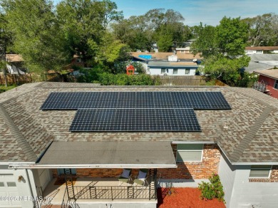 This well-maintained 1960s concrete block home blends classic on Blue Cypress Golf Club in Florida - for sale on GolfHomes.com, golf home, golf lot