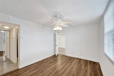 Beautifully maintained 2-bedroom, 2-bath in the highly on Pine Island Ridge Country Club in Florida - for sale on GolfHomes.com, golf home, golf lot