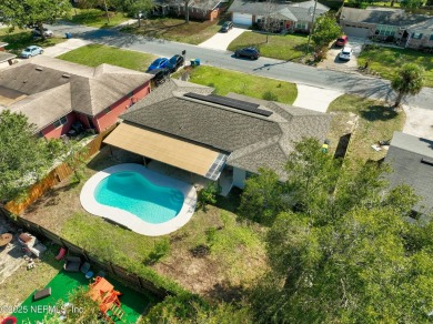 This well-maintained 1960s concrete block home blends classic on Blue Cypress Golf Club in Florida - for sale on GolfHomes.com, golf home, golf lot