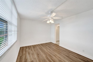 Beautifully maintained 2-bedroom, 2-bath in the highly on Pine Island Ridge Country Club in Florida - for sale on GolfHomes.com, golf home, golf lot