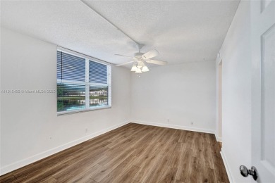 Beautifully maintained 2-bedroom, 2-bath in the highly on Pine Island Ridge Country Club in Florida - for sale on GolfHomes.com, golf home, golf lot