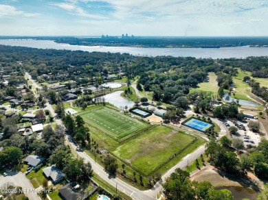 This well-maintained 1960s concrete block home blends classic on Blue Cypress Golf Club in Florida - for sale on GolfHomes.com, golf home, golf lot