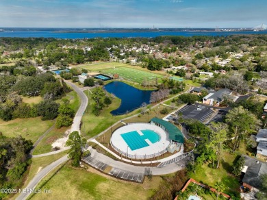 This well-maintained 1960s concrete block home blends classic on Blue Cypress Golf Club in Florida - for sale on GolfHomes.com, golf home, golf lot