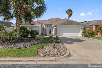 This well-maintained 3-bedroom, 2.5-bath home offers peaceful on South Padre Island Golf Club in Texas - for sale on GolfHomes.com, golf home, golf lot