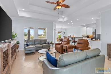 This well-maintained 3-bedroom, 2.5-bath home offers peaceful on South Padre Island Golf Club in Texas - for sale on GolfHomes.com, golf home, golf lot