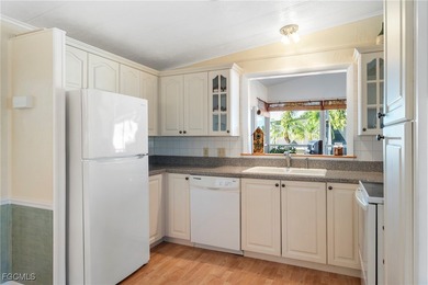 Discover your next chapter in this charming 2-bedroom 2-bath on Six Lakes Country Club in Florida - for sale on GolfHomes.com, golf home, golf lot