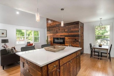 Modern design meets everyday comfort in this striking 3-bedroom on East Lake Golf Club in Georgia - for sale on GolfHomes.com, golf home, golf lot