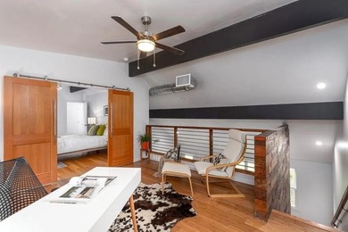 Modern design meets everyday comfort in this striking 3-bedroom on East Lake Golf Club in Georgia - for sale on GolfHomes.com, golf home, golf lot