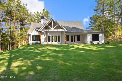 STUNNING home in the beautiful gated subdivision, River Forest on The Club River Forest in Georgia - for sale on GolfHomes.com, golf home, golf lot