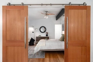 Modern design meets everyday comfort in this striking 3-bedroom on East Lake Golf Club in Georgia - for sale on GolfHomes.com, golf home, golf lot