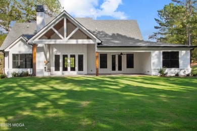 STUNNING home in the beautiful gated subdivision, River Forest on The Club River Forest in Georgia - for sale on GolfHomes.com, golf home, golf lot