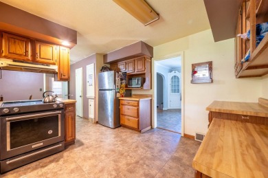 Charming 4-Bedroom Home in a Peaceful Neighborhood Welcome to on Sunset Golf Club in Illinois - for sale on GolfHomes.com, golf home, golf lot