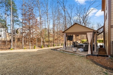 Located in The Georgian, this peaceful, family-oriented on The Frog Golf Club in Georgia - for sale on GolfHomes.com, golf home, golf lot