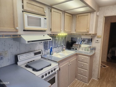 Nice RV lot backed up to the mountain giving you a more private on Bent Creek Golf Course in Tennessee - for sale on GolfHomes.com, golf home, golf lot