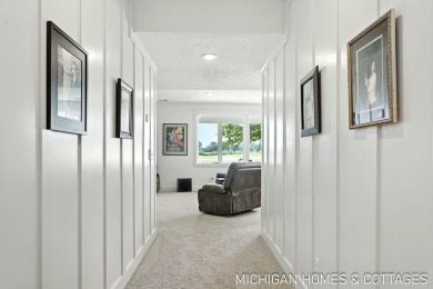 Welcome to 4401 Grand Point, a stunning home nestled on nearly on The Macatwa Legends Golf Course in Michigan - for sale on GolfHomes.com, golf home, golf lot