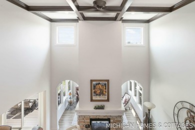 Welcome to 4401 Grand Point, a stunning home nestled on nearly on The Macatwa Legends Golf Course in Michigan - for sale on GolfHomes.com, golf home, golf lot
