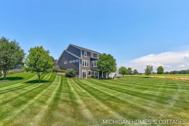 Welcome to 4401 Grand Point, a stunning home nestled on nearly on The Macatwa Legends Golf Course in Michigan - for sale on GolfHomes.com, golf home, golf lot