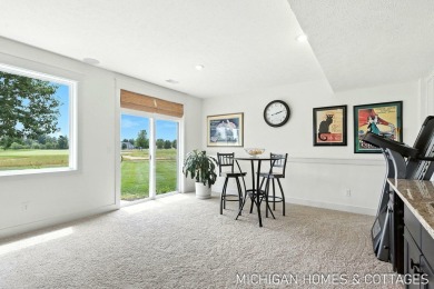 Welcome to 4401 Grand Point, a stunning home nestled on nearly on The Macatwa Legends Golf Course in Michigan - for sale on GolfHomes.com, golf home, golf lot