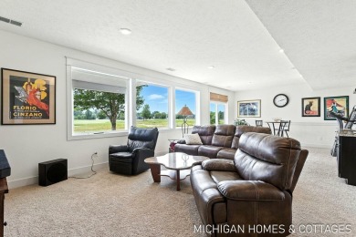 Welcome to 4401 Grand Point, a stunning home nestled on nearly on The Macatwa Legends Golf Course in Michigan - for sale on GolfHomes.com, golf home, golf lot