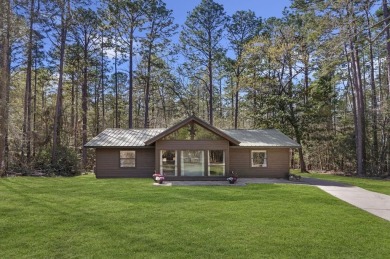 Nestled in Nature's Embrace, this enchanting 3br, 2ba haven on Rayburn Country Club in Texas - for sale on GolfHomes.com, golf home, golf lot
