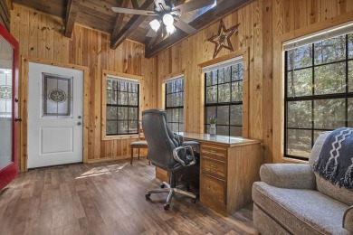 Nestled in Nature's Embrace, this enchanting 3br, 2ba haven on Rayburn Country Club in Texas - for sale on GolfHomes.com, golf home, golf lot