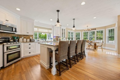 A tasteful and elegant home with inviting front porch is tucked on The Captains Golf Courses  in Massachusetts - for sale on GolfHomes.com, golf home, golf lot