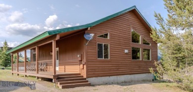 This Charming Cabin is Ready for You- Fully Furnished and on Island Park Village Resort Golf Course in Idaho - for sale on GolfHomes.com, golf home, golf lot