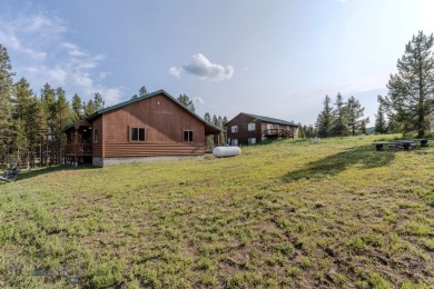 This Charming Cabin is Ready for You- Fully Furnished and on Island Park Village Resort Golf Course in Idaho - for sale on GolfHomes.com, golf home, golf lot