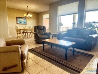 Enjoy panoramic views of the lake and golf course from this on South Padre Island Golf Club in Texas - for sale on GolfHomes.com, golf home, golf lot