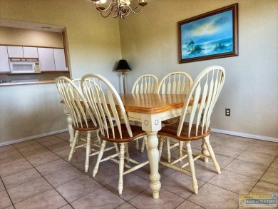 Enjoy panoramic views of the lake and golf course from this on South Padre Island Golf Club in Texas - for sale on GolfHomes.com, golf home, golf lot