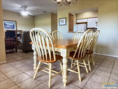 Enjoy panoramic views of the lake and golf course from this on South Padre Island Golf Club in Texas - for sale on GolfHomes.com, golf home, golf lot